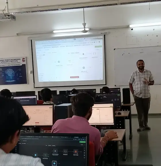 Anand teaching an n8n AI agent workflow at GTU ITR
