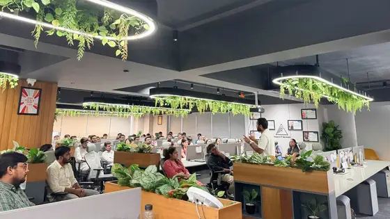 Anand Shrivastava training 100+ Impero IT Services employees on the open office floor