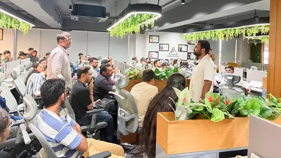Impero IT Services teams listening during the AI training session